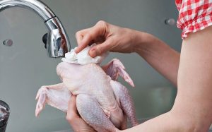 washing chicken